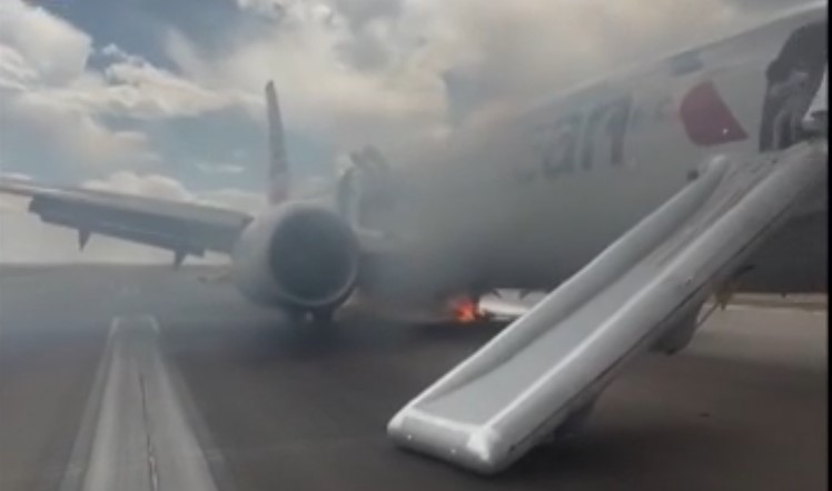 Emergency Evacuation! American Airlines Flight Aborts Takeoff After Landing Gear Fire
